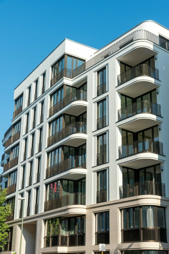 Modern bedroom in corporate rental with clean linens.